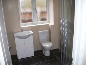 Family bathroom with bath and shower