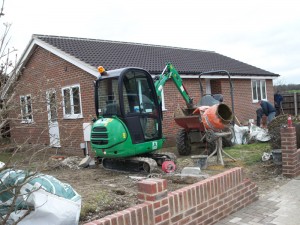 Bungalow complete - landscaping commencing including block paving to front