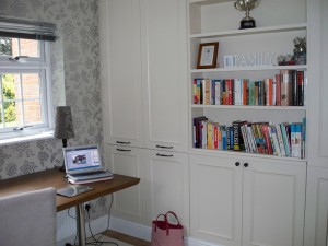 Bespoke cupboards and bookshelf made and decorated