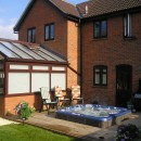 Rear of property at completion of extension, conservatory and landscaping