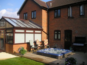 Rear of property at completion of extension, conservatory and landscaping