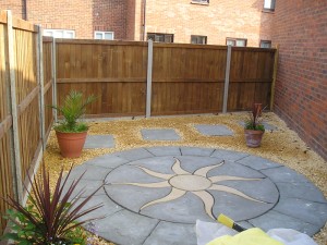 Landscaping and fencing at side of new extension