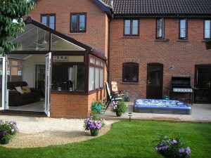 Rear of property at completion of extension, conservatory and landscaping