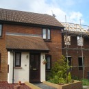 Front of property with extension in progress to the right